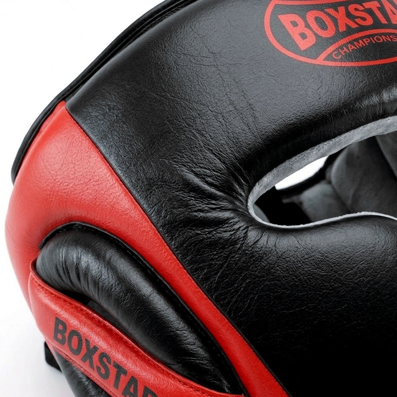 Black and red boxing headgear with 'Boxstar' branding on a white background